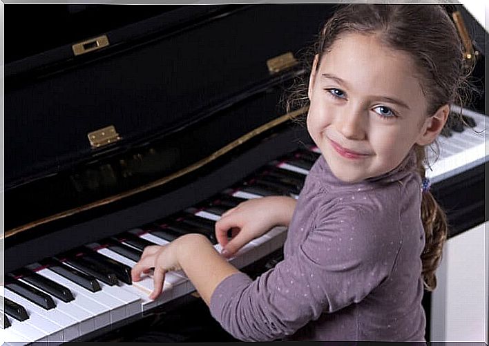 Girl plays the piano