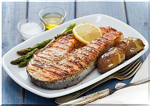 Fried piece of salmon on plate